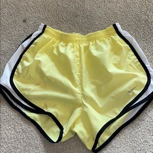 Nike yellow athletic shorts